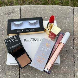 NWT Makeup Beauty Bundle. Lipstick, Lip Plumper, Bronzer, Lashes, and Eye Cream.